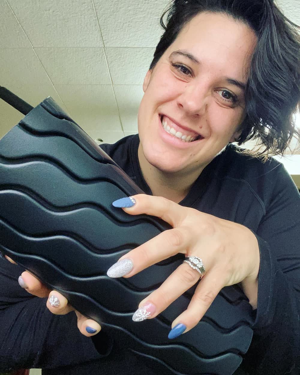 Jenna Taylor smiling in the gym